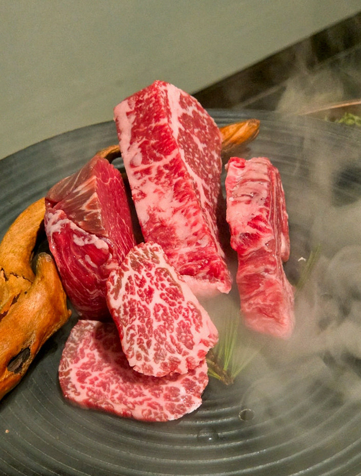 DAEBOJUNG City Hall · premium marbled Hanwoo beef presented before grilling