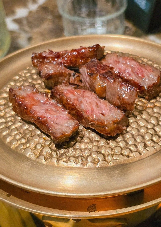 DAEBOJUNG City Hall · premium marbled Hanwoo beef presented before grilling