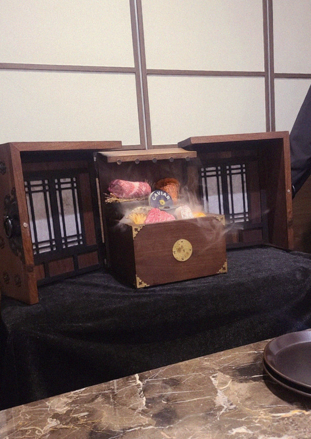 DAEBOJUNG City Hall · the signature Hanwoo showing — marbled beef cuts and caviar presented in a display chest