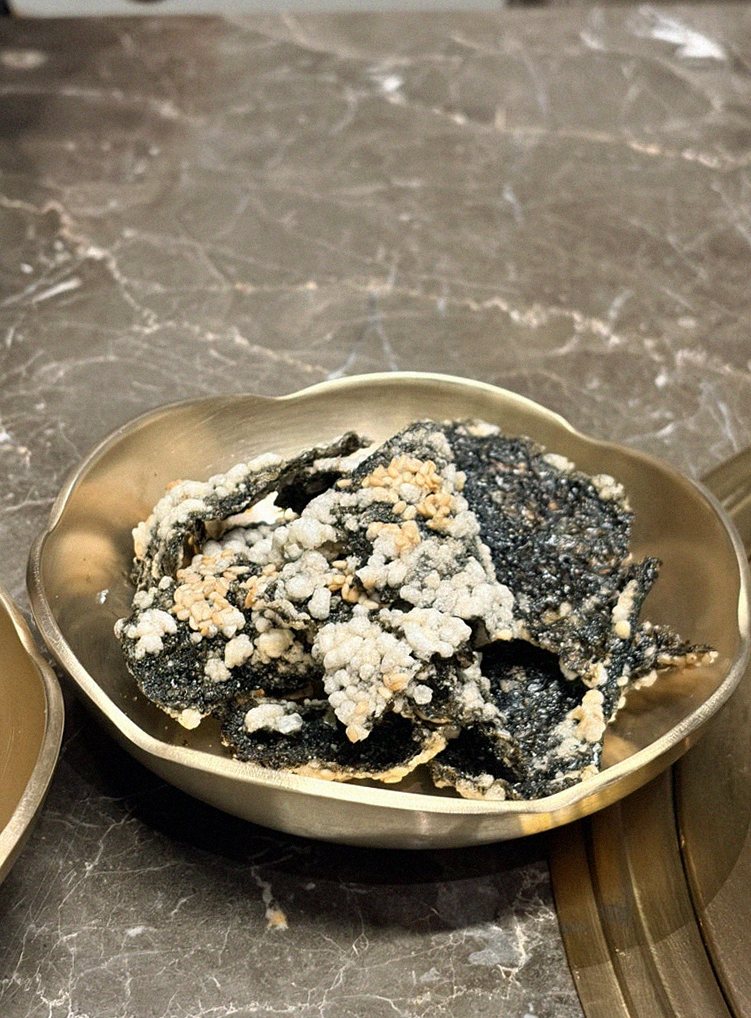 DAEBOJUNG Yeouido · the signature Hanwoo showing — marbled beef cuts and caviar presented in a display chest