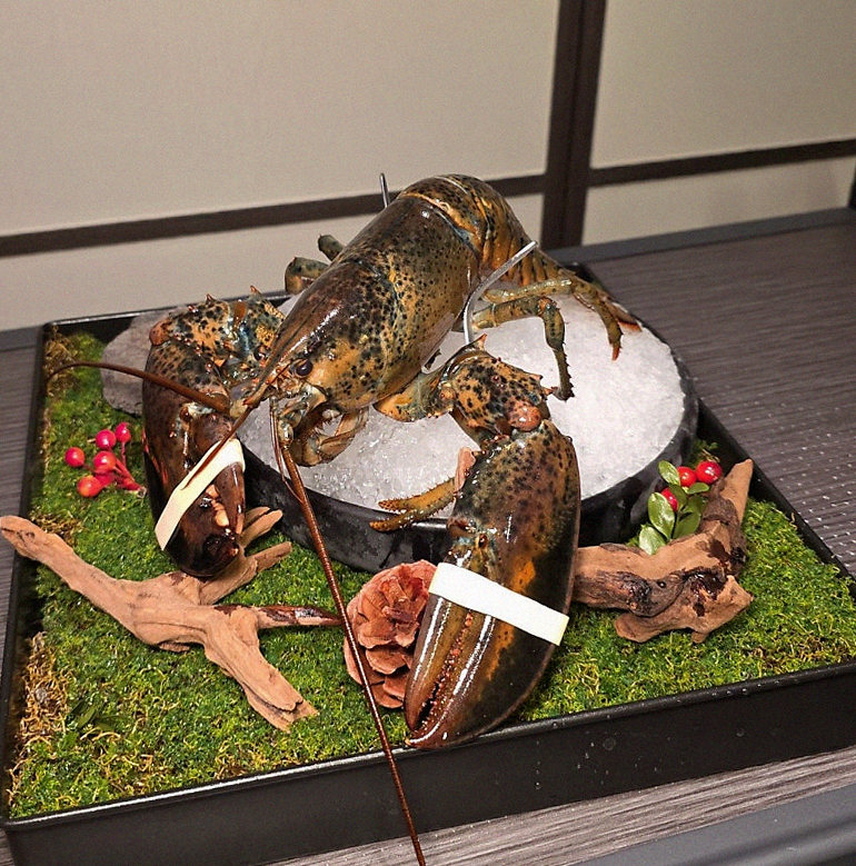 DAEBOJUNG Yeouido · the signature Hanwoo showing — marbled beef cuts and caviar presented in a display chest