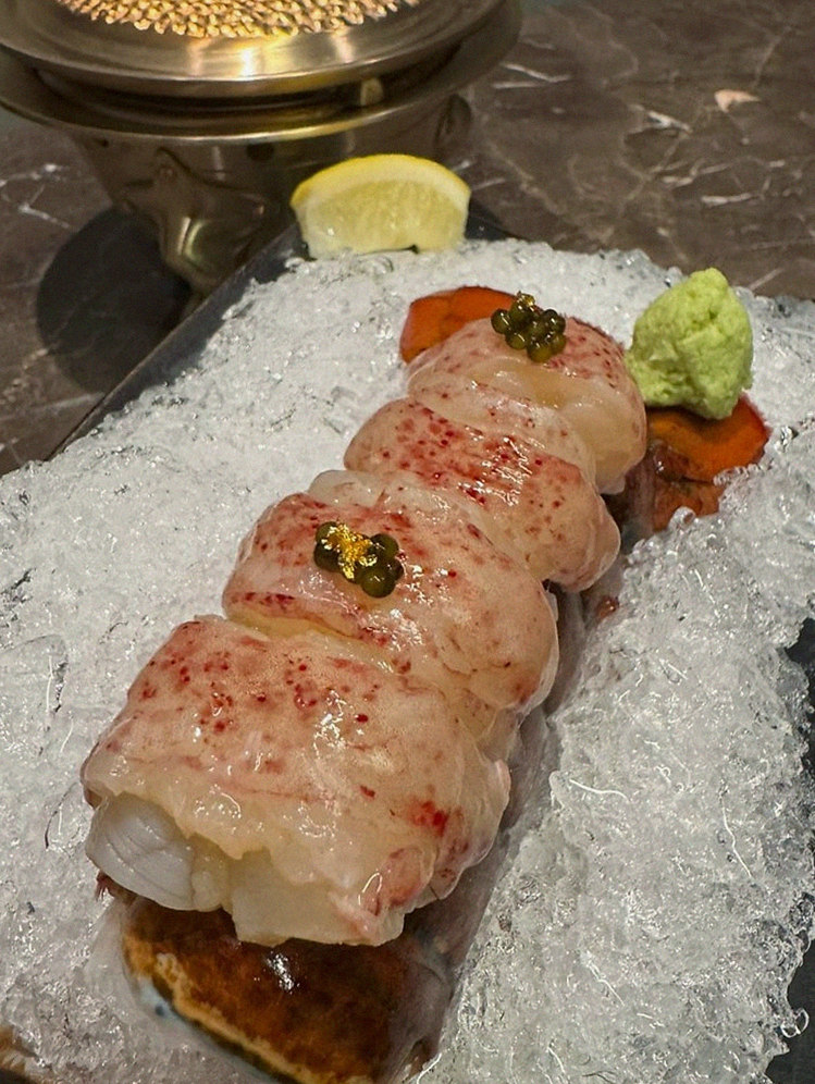 DAEBOJUNG Yeouido · seafood course served alongside the beef
