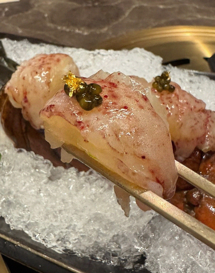 DAEBOJUNG Yeouido · the signature Hanwoo showing — marbled beef cuts and caviar presented in a display chest