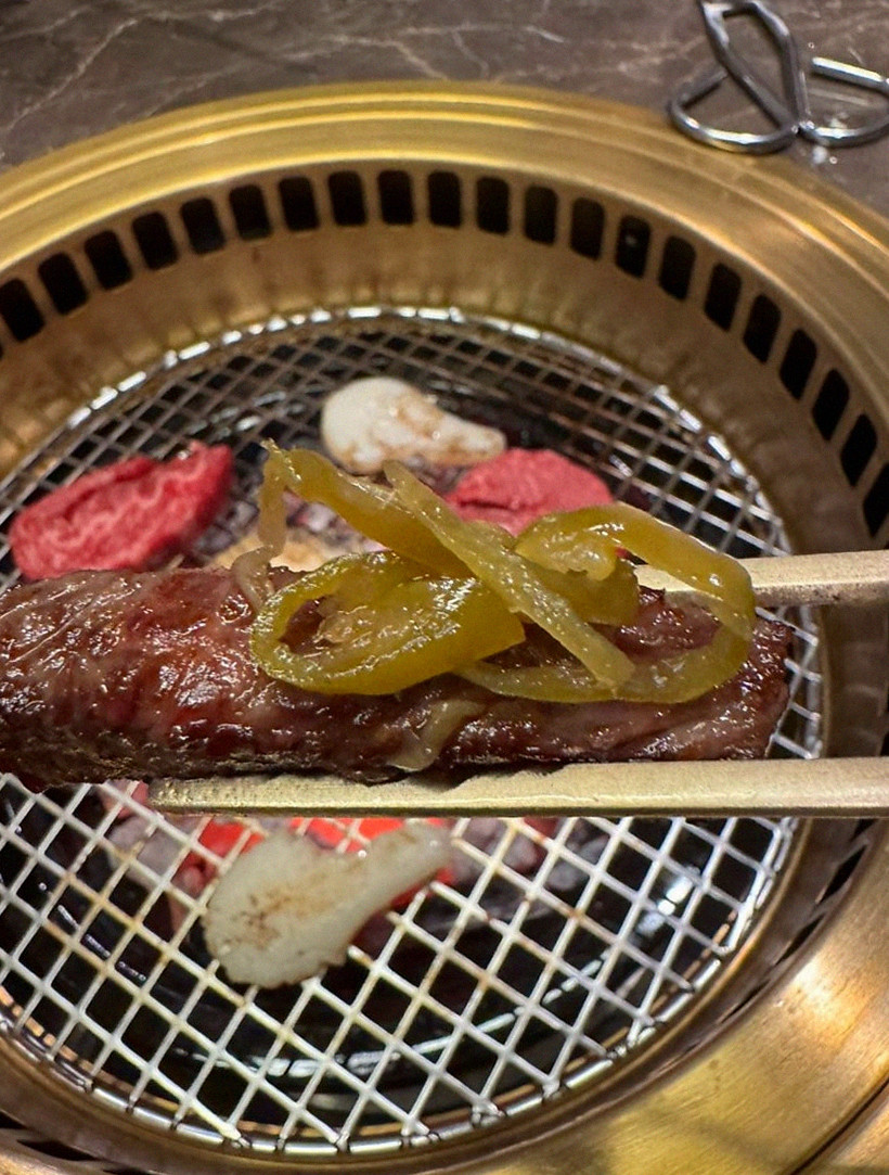 DAEBOJUNG Yeouido · the signature Hanwoo showing — marbled beef cuts and caviar presented in a display chest