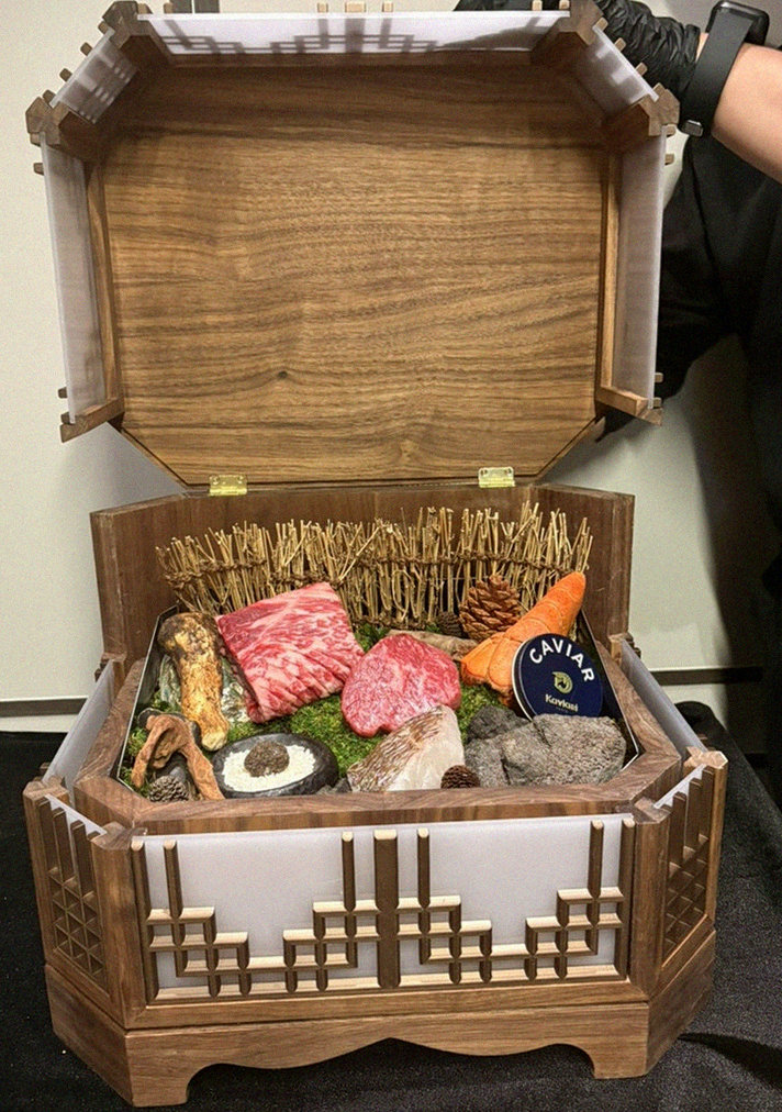 DAEBOJUNG Yeouido · the signature Hanwoo showing — marbled beef cuts and caviar presented in a display chest