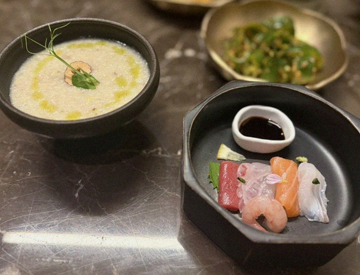 DAEBOJUNG Yeouido · seafood course served alongside the beef