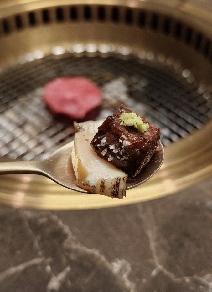 DAEBOJUNG Yeouido · the signature Hanwoo showing — marbled beef cuts and caviar presented in a display chest