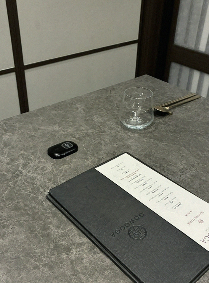 GOWOOGA Gwanghwamun · the signature Hanwoo showing — marbled beef cuts and caviar presented in a display chest