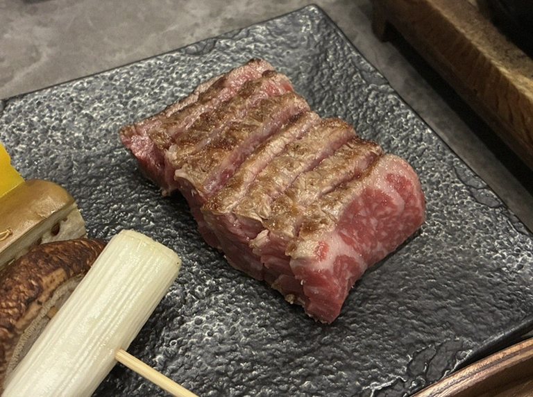 GOWOOGA Gwanghwamun · premium marbled Hanwoo beef presented before grilling