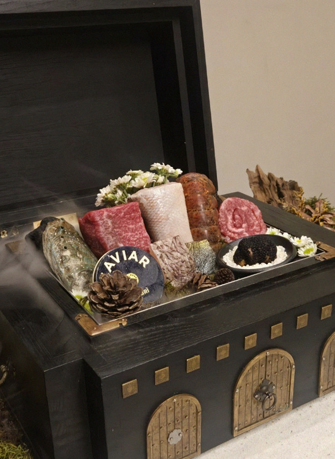 GOWOOGA Gwanghwamun · the signature Hanwoo showing — marbled beef cuts and caviar presented in a display chest