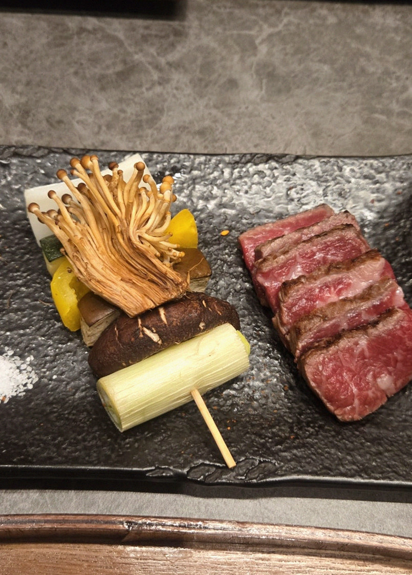 GOWOOGA Gwanghwamun · the signature Hanwoo showing — marbled beef cuts and caviar presented in a display chest