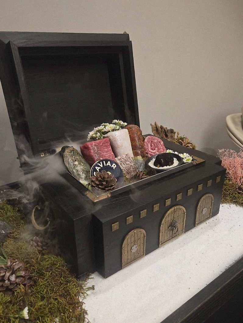 GOWOOGA Gwanghwamun · the signature Hanwoo showing — marbled beef cuts and caviar presented in a display chest