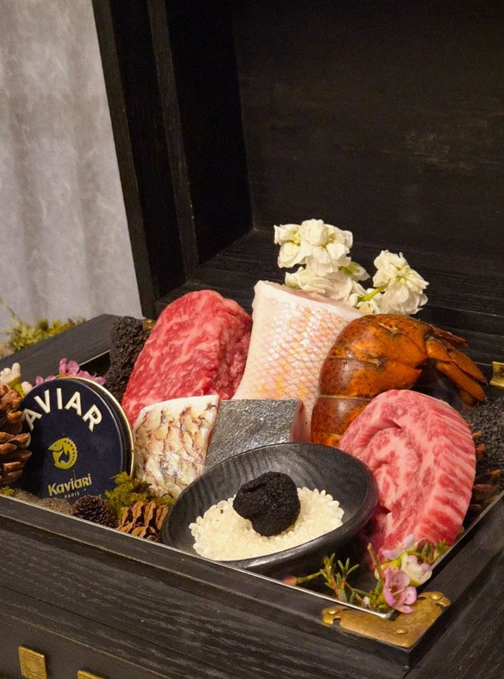 GOWOOGA Gwanghwamun · the signature Hanwoo showing — marbled beef cuts and caviar presented in a display chest