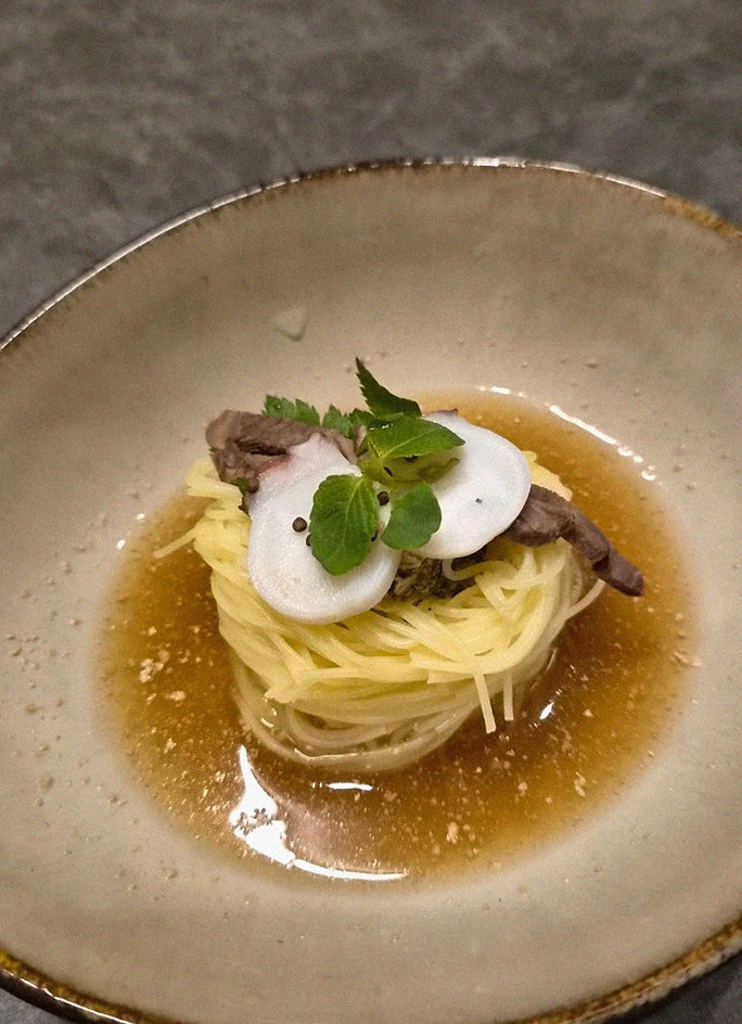 GOWOOGA Gwanghwamun · a plated course of Hanwoo beef