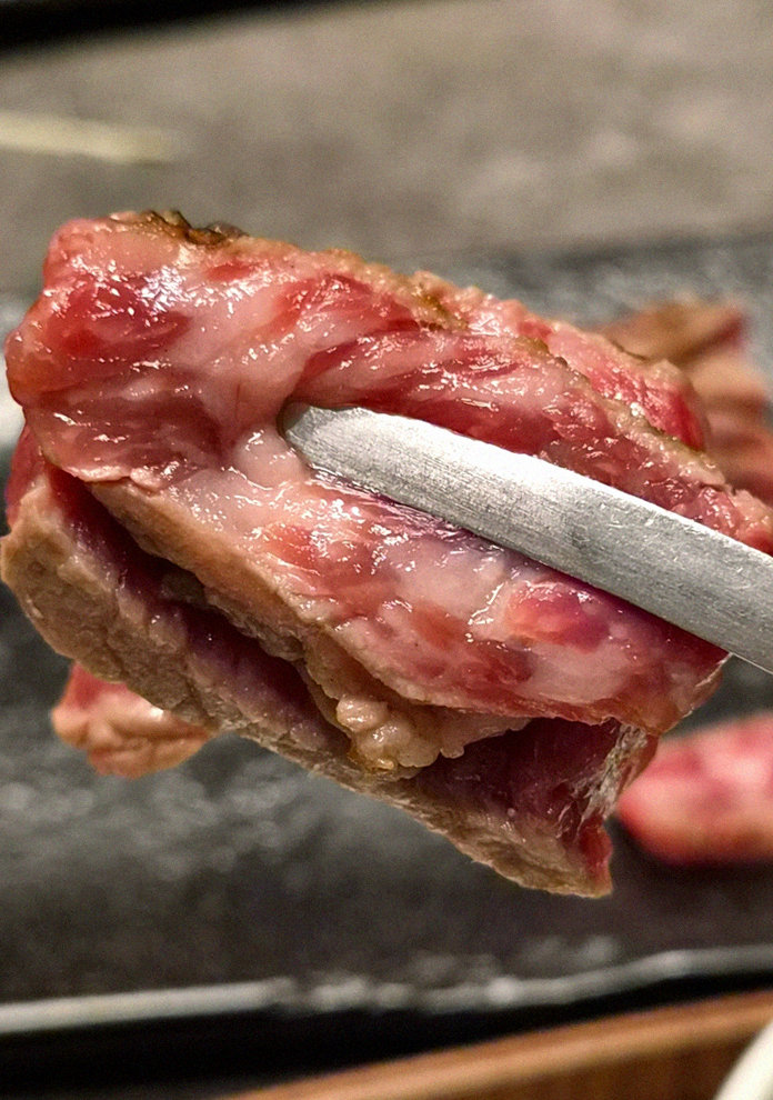 GOWOOGA Gwanghwamun · premium marbled Hanwoo beef presented before grilling