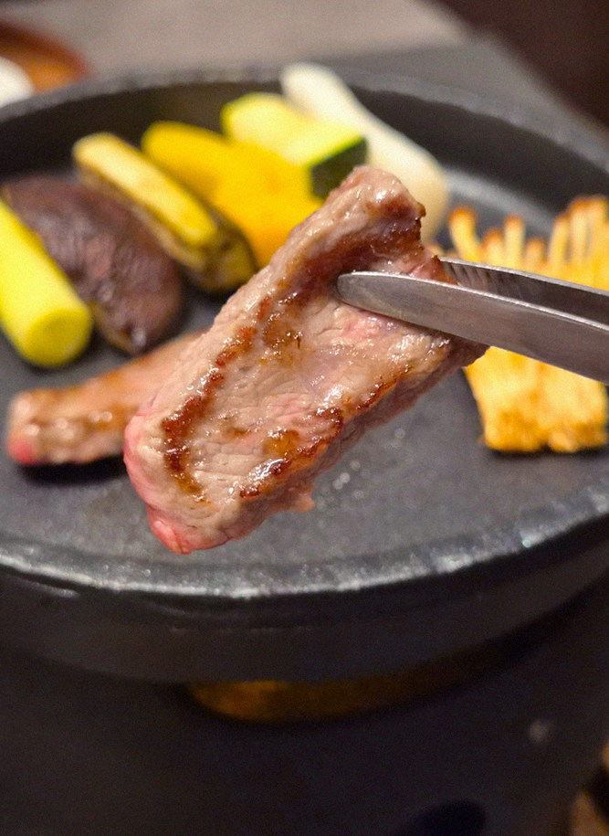 GOWOOGA Gwanghwamun · Hanwoo beef grilling over binchotan charcoal