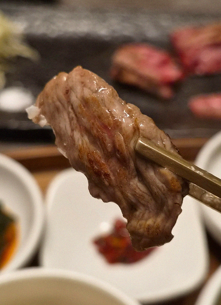 GOWOOGA Gwanghwamun · premium marbled Hanwoo beef presented before grilling