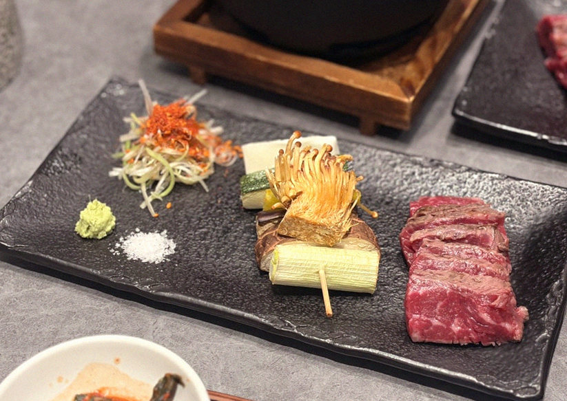 GOWOOGA Gangnam·Yeoksam · the signature Hanwoo showing — marbled beef cuts and caviar presented in a display chest