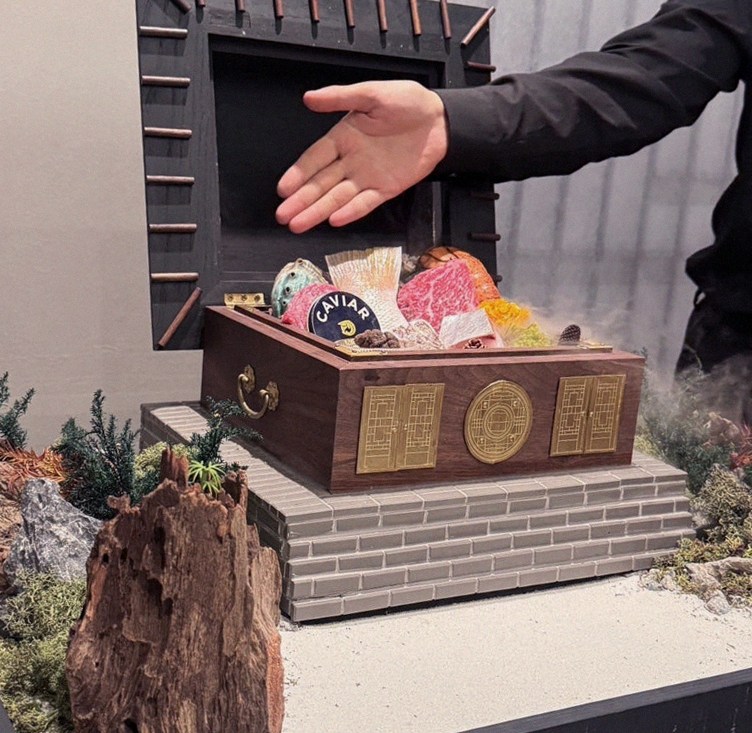 GOWOOGA Gangnam·Yeoksam · the signature Hanwoo showing — marbled beef cuts and caviar presented in a display chest