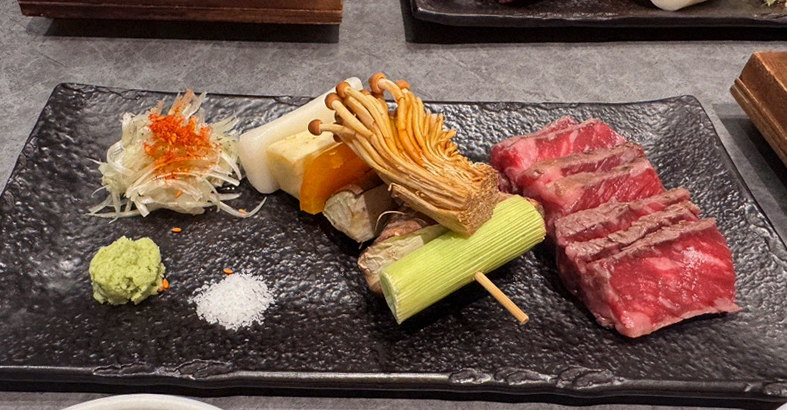 GOWOOGA Gangnam·Yeoksam · the signature Hanwoo showing — marbled beef cuts and caviar presented in a display chest