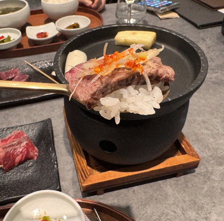 GOWOOGA Gangnam·Yeoksam · the signature Hanwoo showing — marbled beef cuts and caviar presented in a display chest