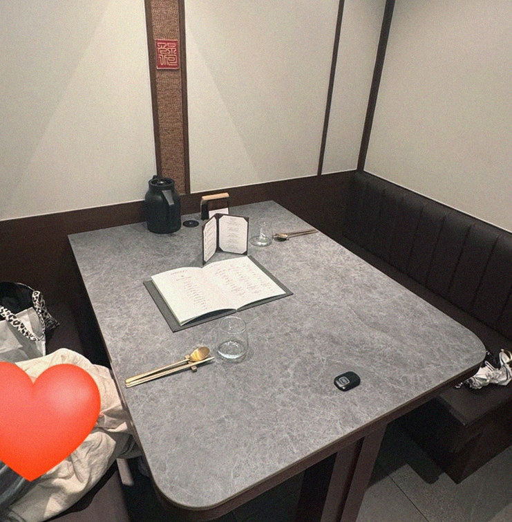 GOWOOGA Gangnam·Yeoksam · the signature Hanwoo showing — marbled beef cuts and caviar presented in a display chest