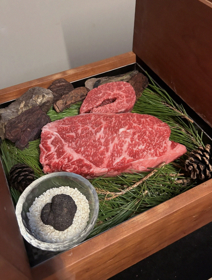 WOOARA Gwanghwamun · the signature Hanwoo showing — marbled beef cuts and caviar presented in a display chest