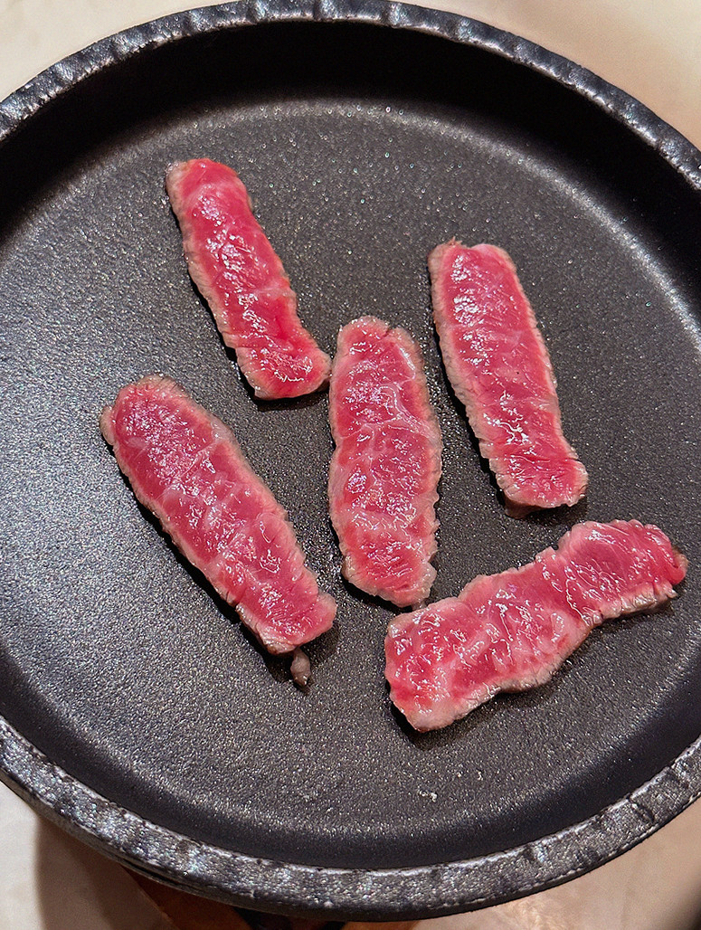 WOOARA Gwanghwamun · Hanwoo beef grilling over binchotan charcoal