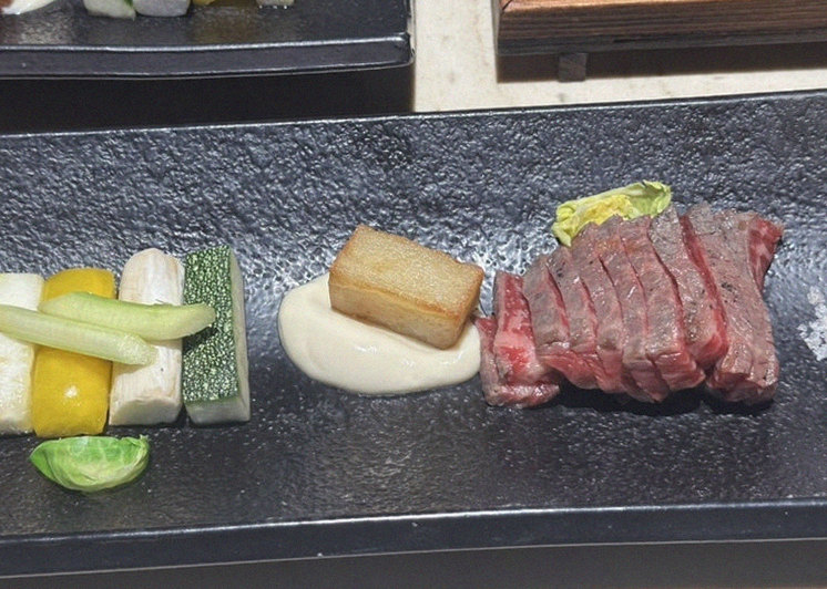 WOOARA Gwanghwamun · the signature Hanwoo showing — marbled beef cuts and caviar presented in a display chest