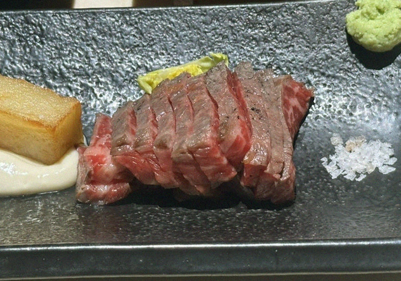 WOOARA Gwanghwamun · premium marbled Hanwoo beef presented before grilling
