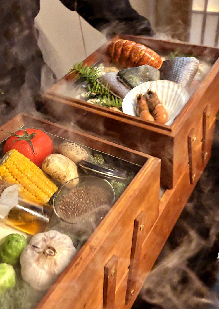 WOOARA Gwanghwamun · the signature Hanwoo showing — marbled beef cuts and caviar presented in a display chest