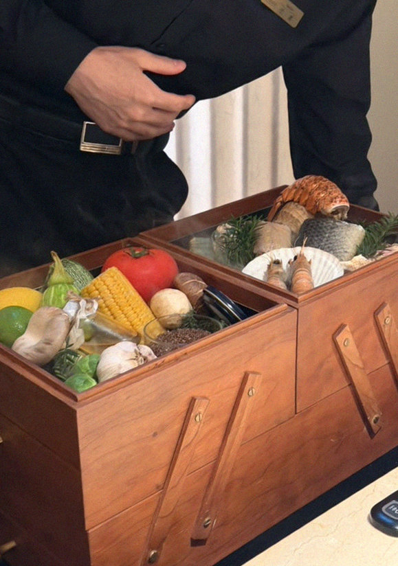 WOOARA Gwanghwamun · the signature Hanwoo showing — marbled beef cuts and caviar presented in a display chest