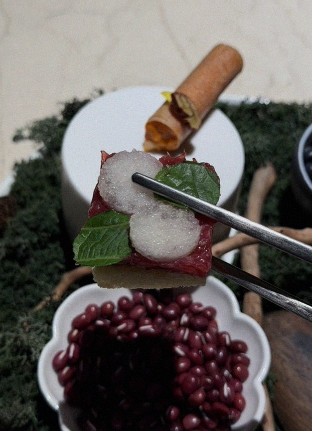 WOOARA Gwanghwamun · the signature Hanwoo showing — marbled beef cuts and caviar presented in a display chest