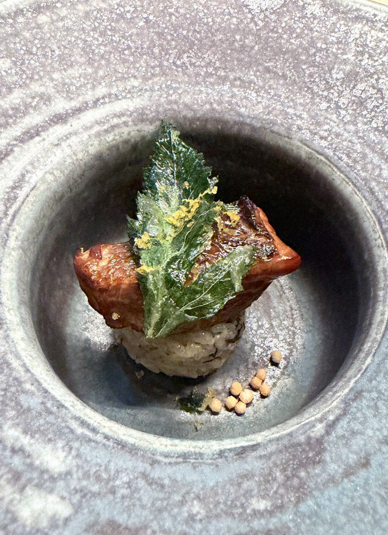 WOOARA Gwanghwamun · a plated course of Hanwoo beef