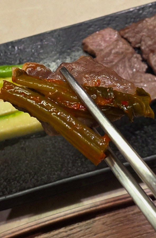 WOOARA Yeouido · premium marbled Hanwoo beef presented before grilling