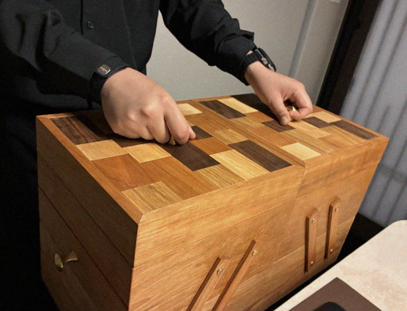 WOOARA Yeouido · the signature Hanwoo showing — marbled beef cuts and caviar presented in a display chest