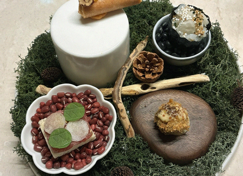 WOOARA Yeouido · the signature Hanwoo showing — marbled beef cuts and caviar presented in a display chest