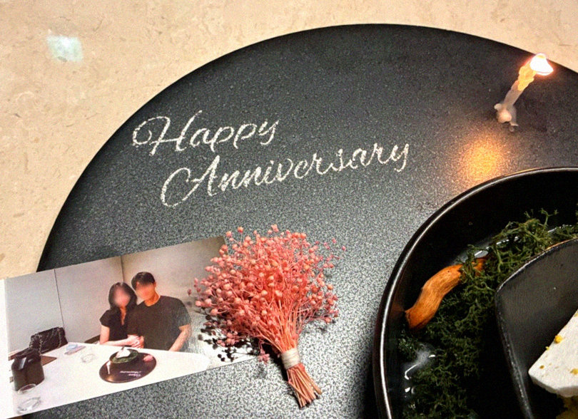 WOOARA Yeouido · the signature Hanwoo showing — marbled beef cuts and caviar presented in a display chest