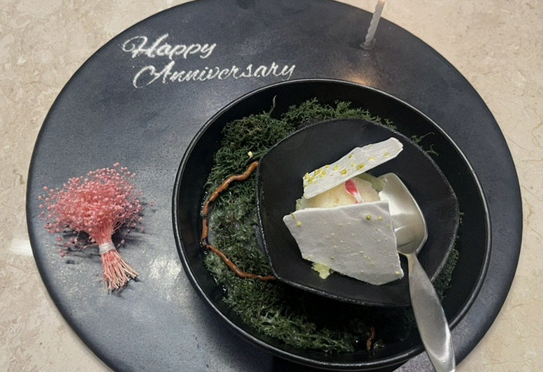 WOOARA Yeouido · the signature Hanwoo showing — marbled beef cuts and caviar presented in a display chest