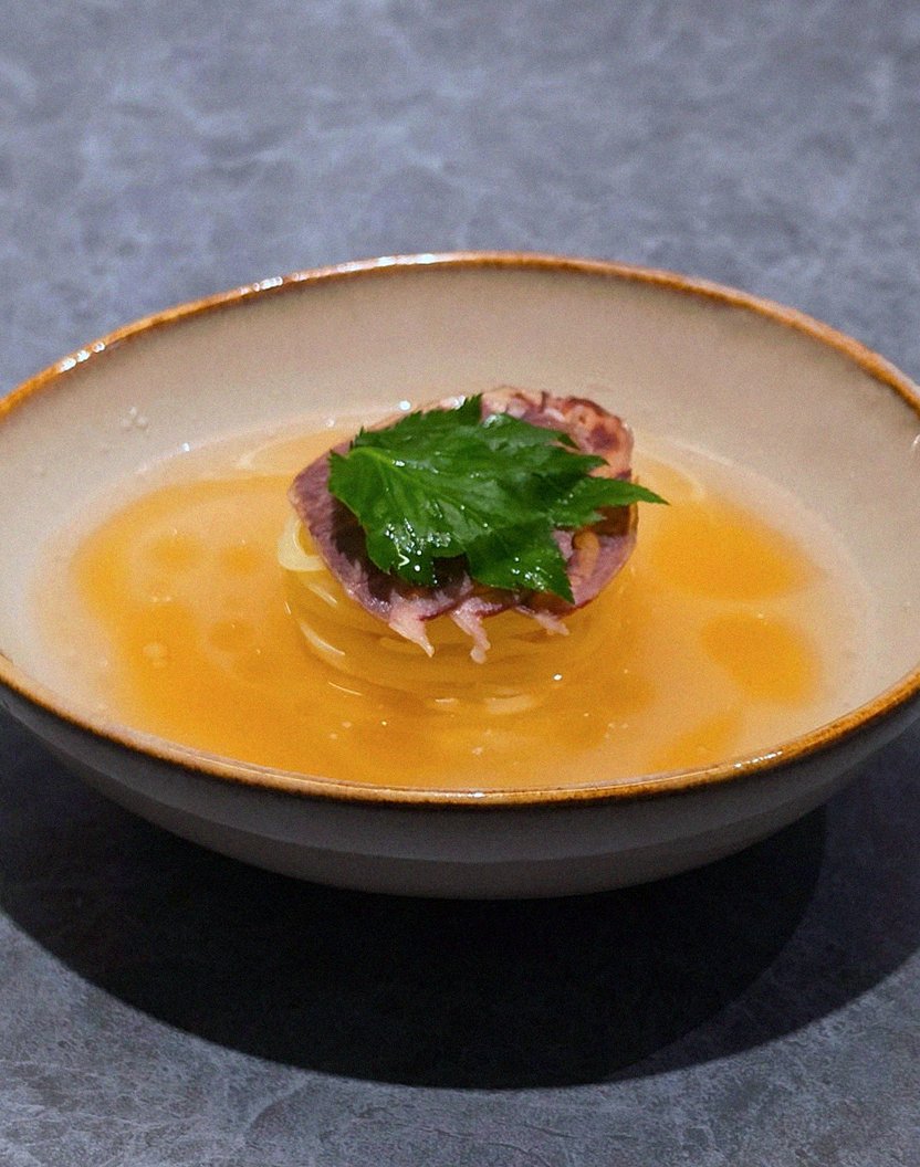WOOHANA Jonggak · a plated course of Hanwoo beef