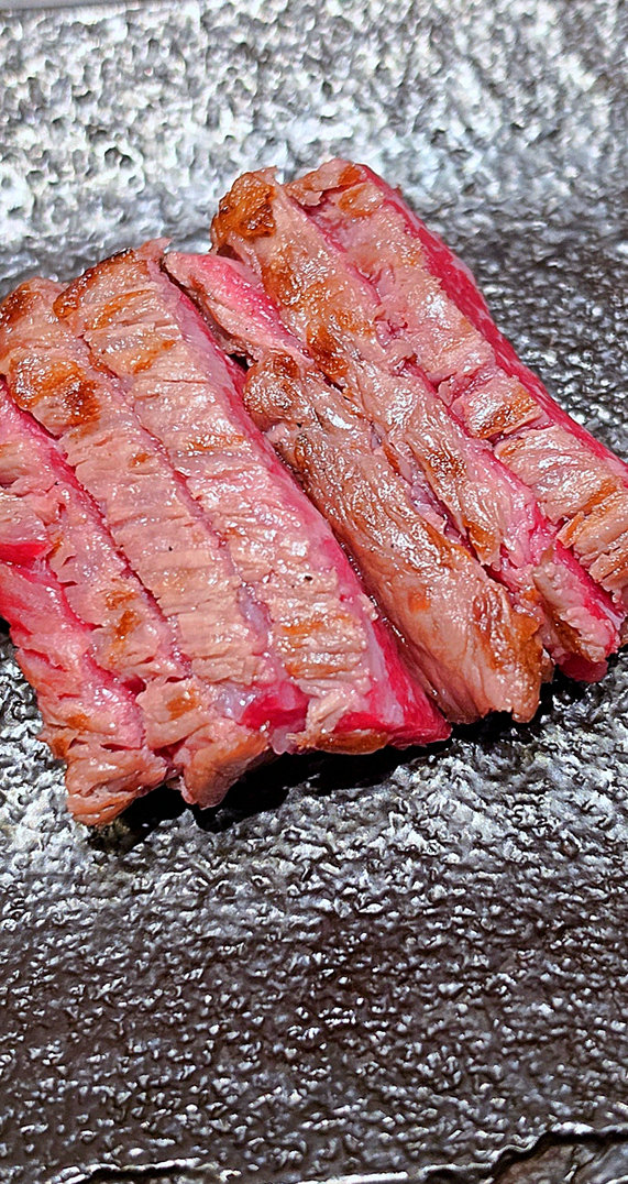 WOOHANA Jonggak · Hanwoo beef grilling over binchotan charcoal