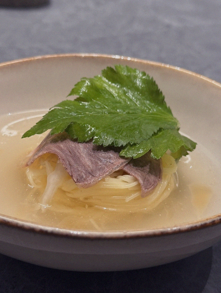 WOOHANA Jonggak · a plated course of Hanwoo beef