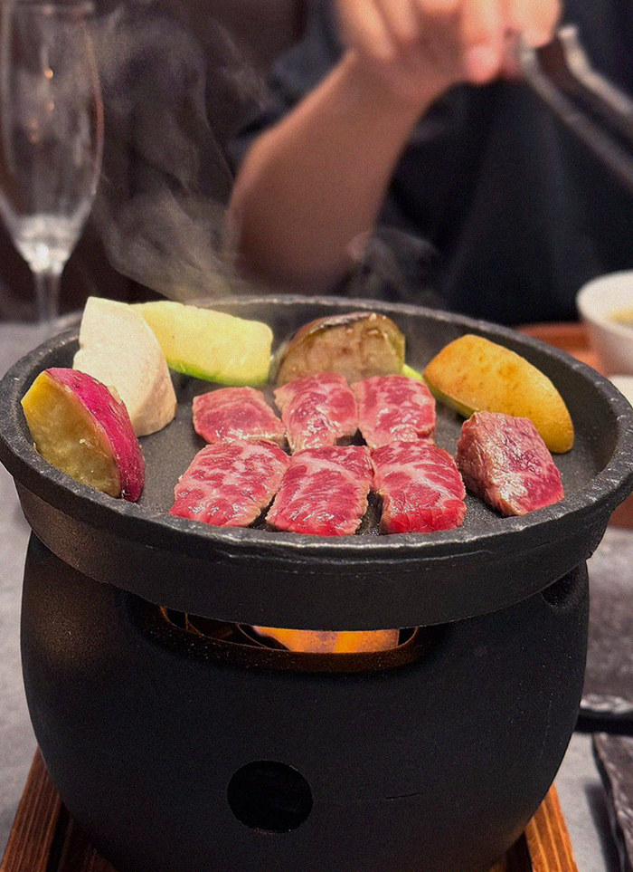 WOOHANA Jonggak · Hanwoo beef grilling over binchotan charcoal