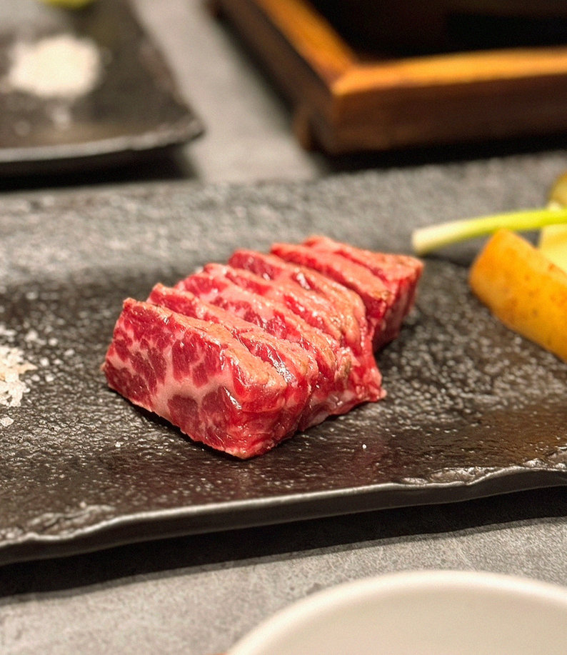 WOOHANA Jonggak · premium marbled Hanwoo beef presented before grilling