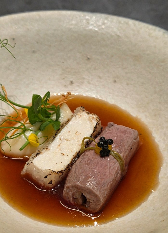 WOOHANA Jonggak · a plated course of Hanwoo beef