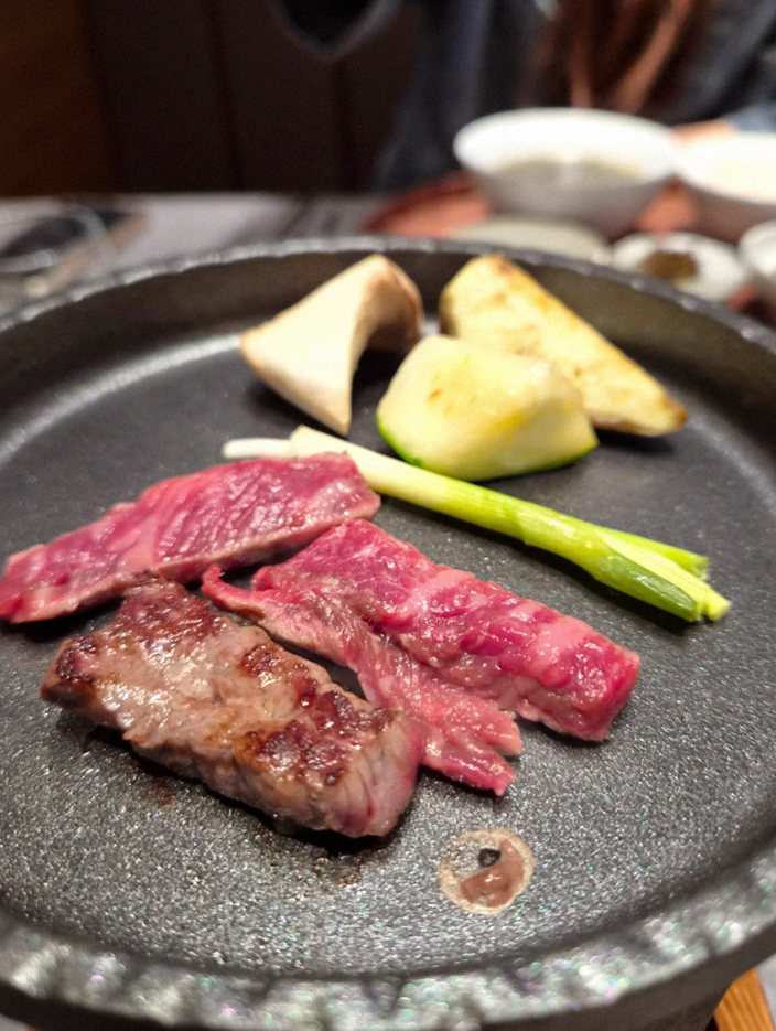 WOOHANA Jonggak · Hanwoo beef grilling over binchotan charcoal