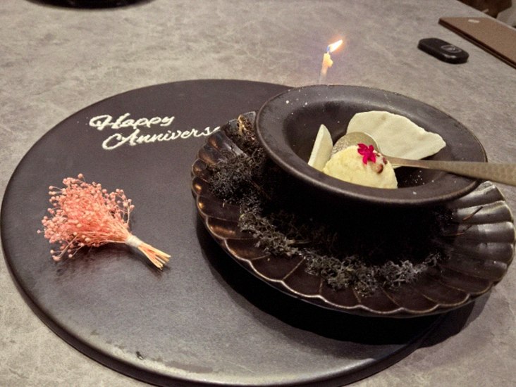 WOOHANA Jonggak · the signature Hanwoo showing — marbled beef cuts and caviar presented in a display chest