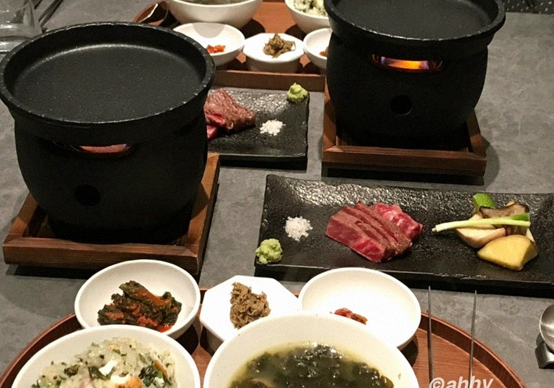 WOOHANA Yeouido · the signature Hanwoo showing — marbled beef cuts and caviar presented in a display chest