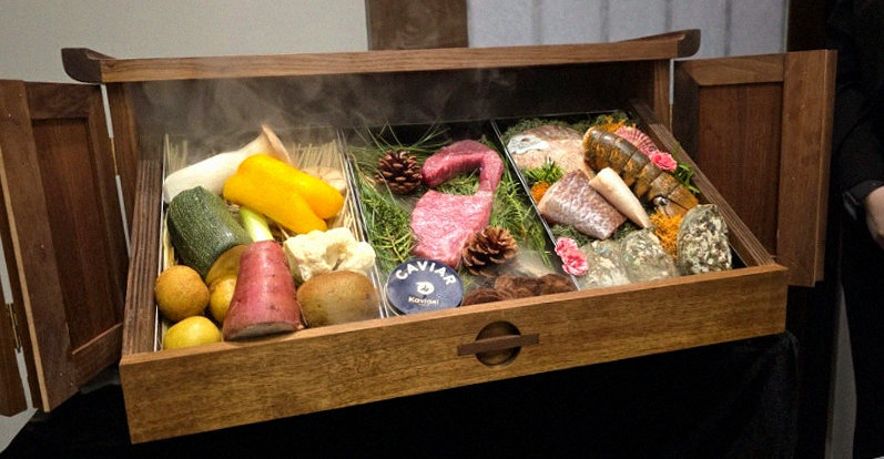 WOOHANA Yeouido · the signature Hanwoo showing — marbled beef cuts and caviar presented in a display chest