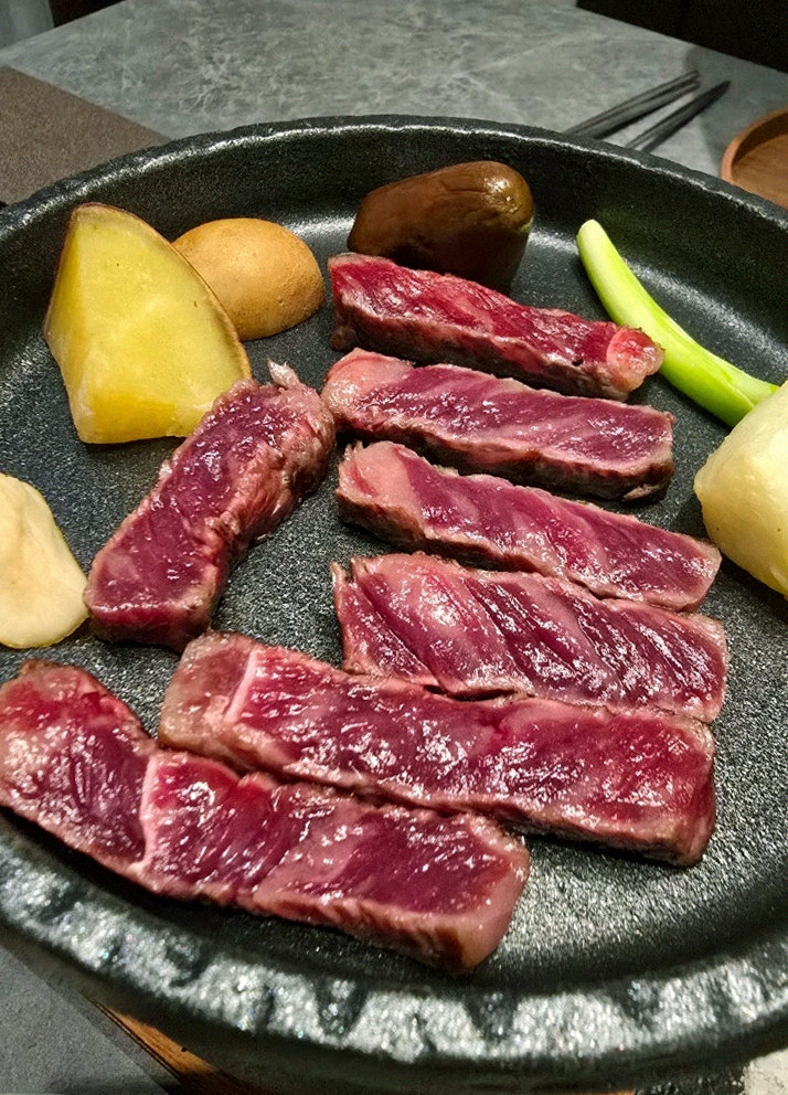 WOOHANA Yeouido · premium marbled Hanwoo beef presented before grilling